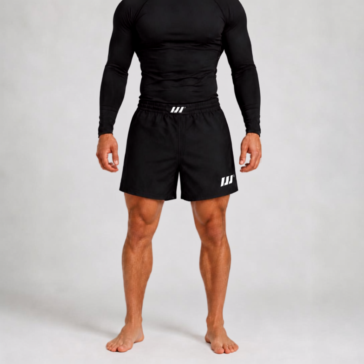 Iron Jiu Jitsu Black 5 inch Combat Cut Hybrid Shorts on model